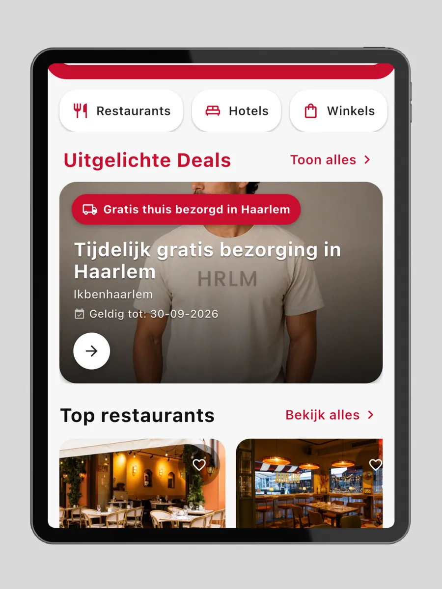 De Haarlem Guide app op een iPad met restaurants, hotels, winkels en uitgelichte deals